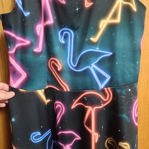 Neon flamingo pleated dress